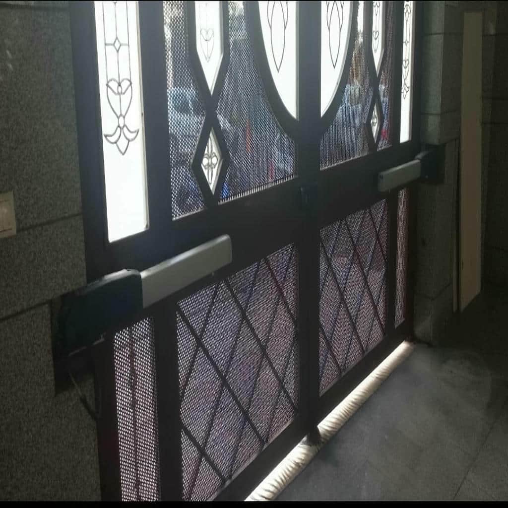 نصب جک درب پارکینگ اتوماتیک استاندارد در ایرانشهر