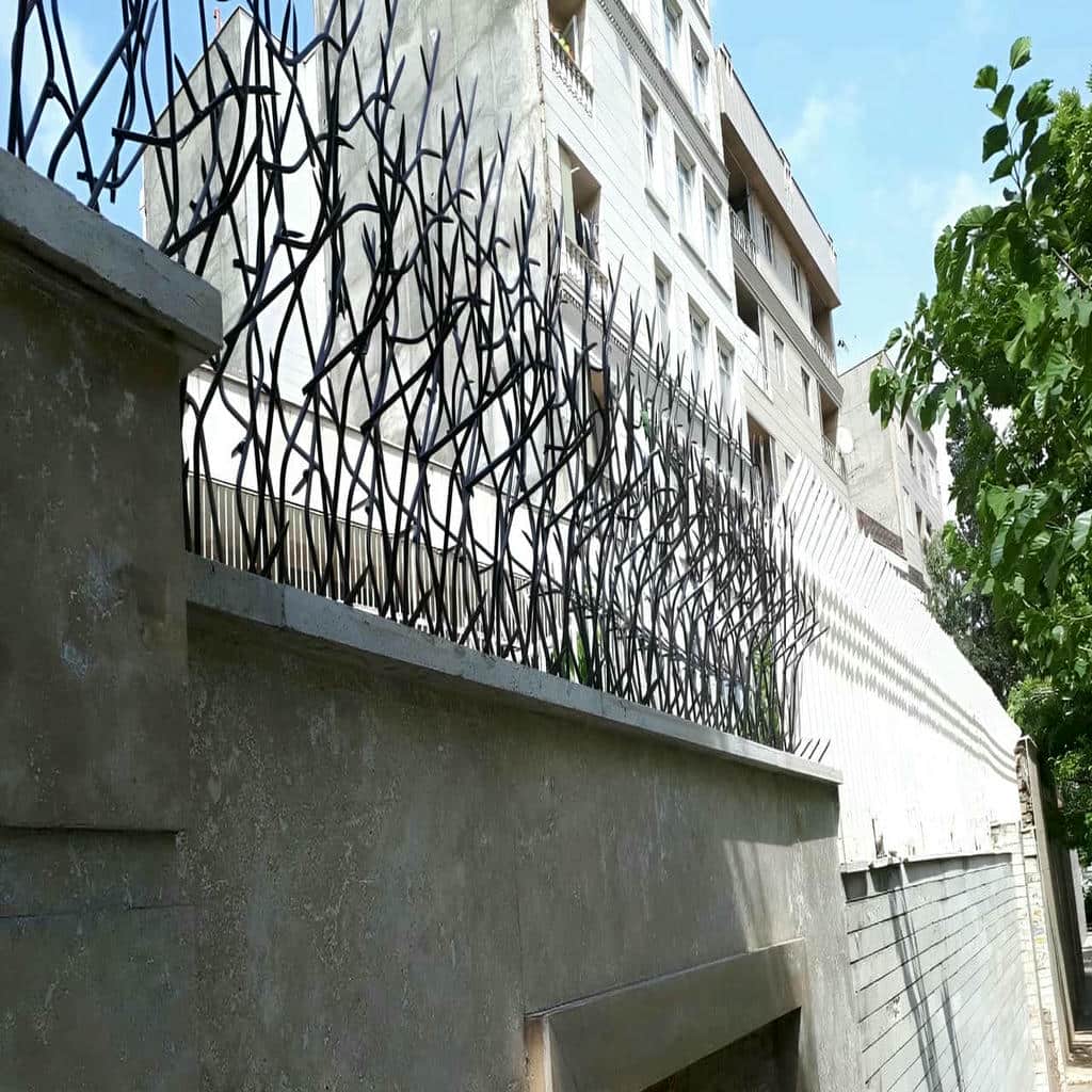 خدمات نصب حفاظ دیوار ویلا نمای سنگی با تراز دقیق